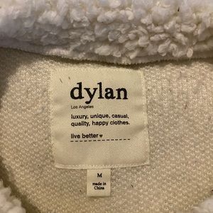 Dylan! Excellent used condition, worn a few times.